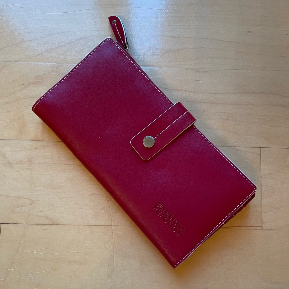 Kenneth Cole Reaction red leather wallet; credit card, cash, coin slots